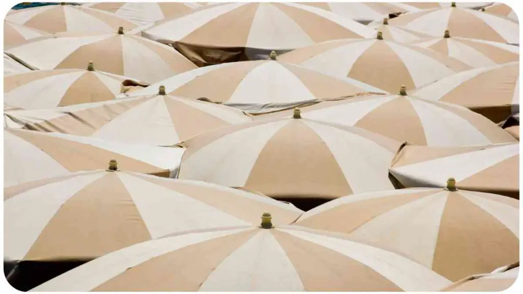 beige and white striped umbrellas