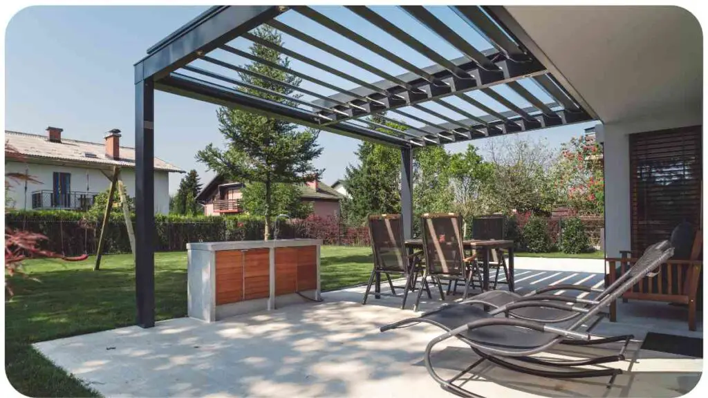 an outdoor dining area with a pergola and chairs
