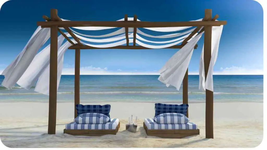 a beach scene with two lounge chairs under a canopy