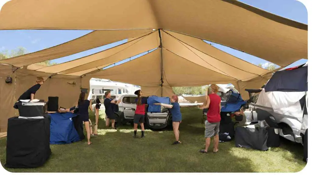 a group of people standing around under a tent