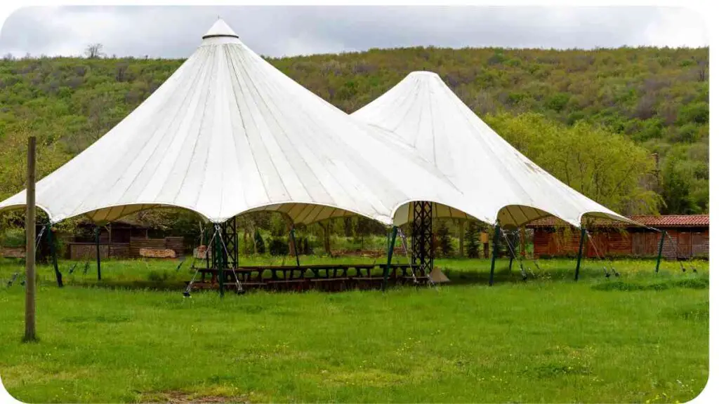 a large tent sitting in the middle of a field