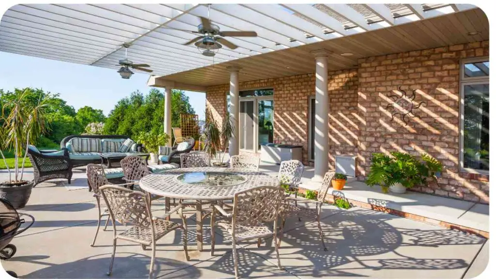 a patio with patio furniture and a ceiling fan