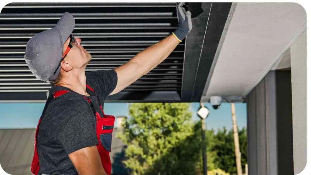 a person in a hard hat and overalls working on a roof