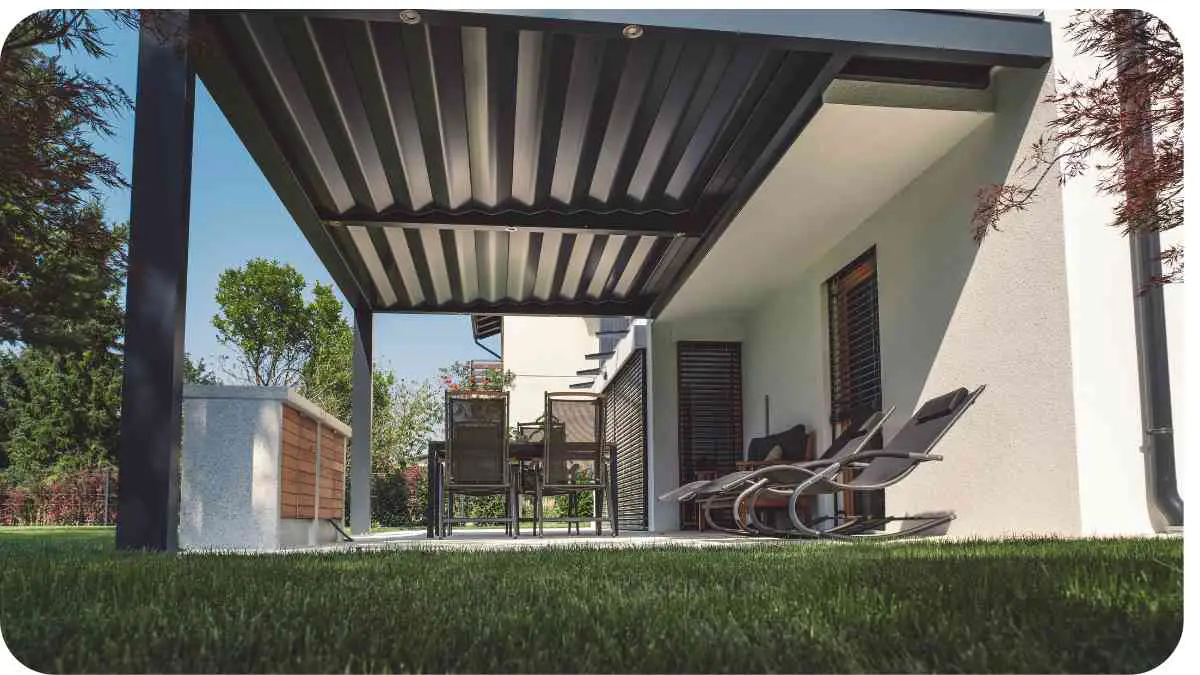 An outdoor patio with an awning over it