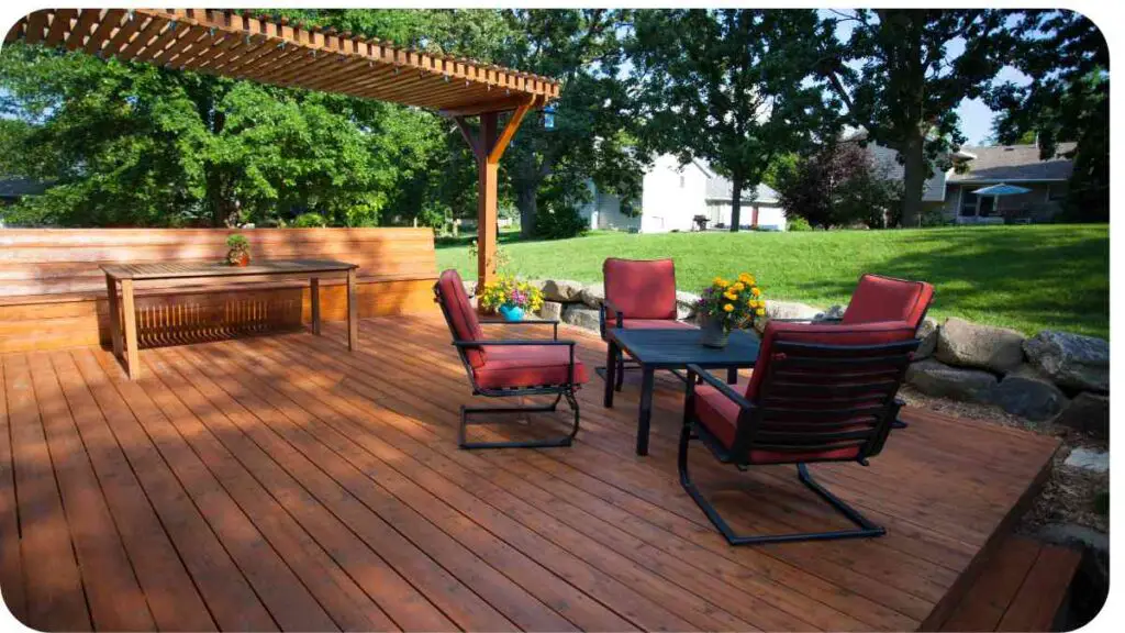 a wooden deck with patio furniture and a gazebo