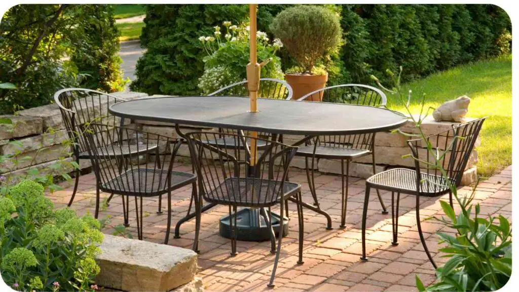 an outdoor dining table and chairs with an umbrella