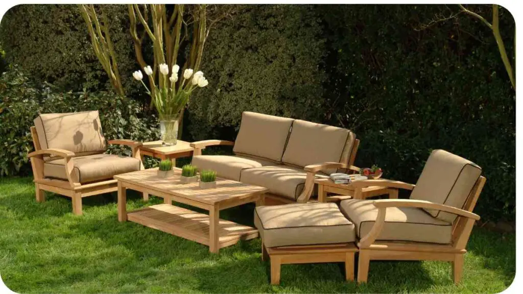 wooden patio furniture set with cushions on grass