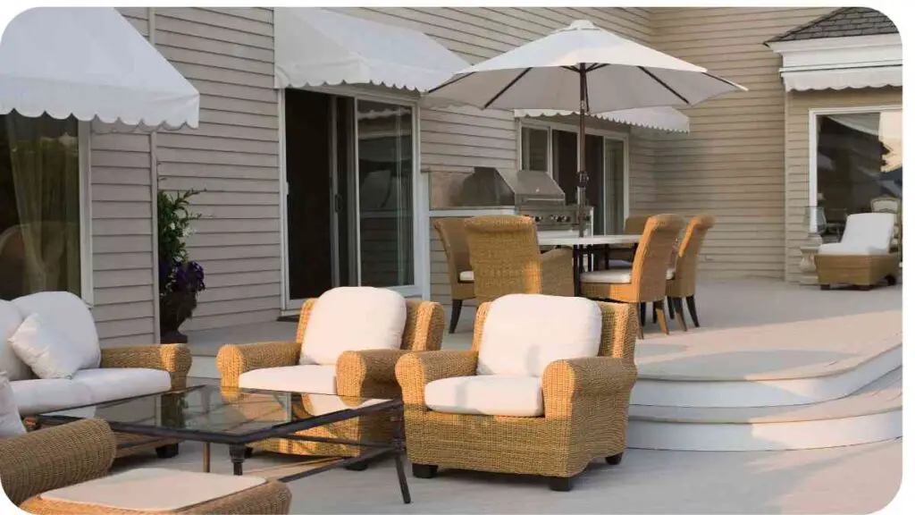 an outdoor patio with wicker furniture and umbrellas